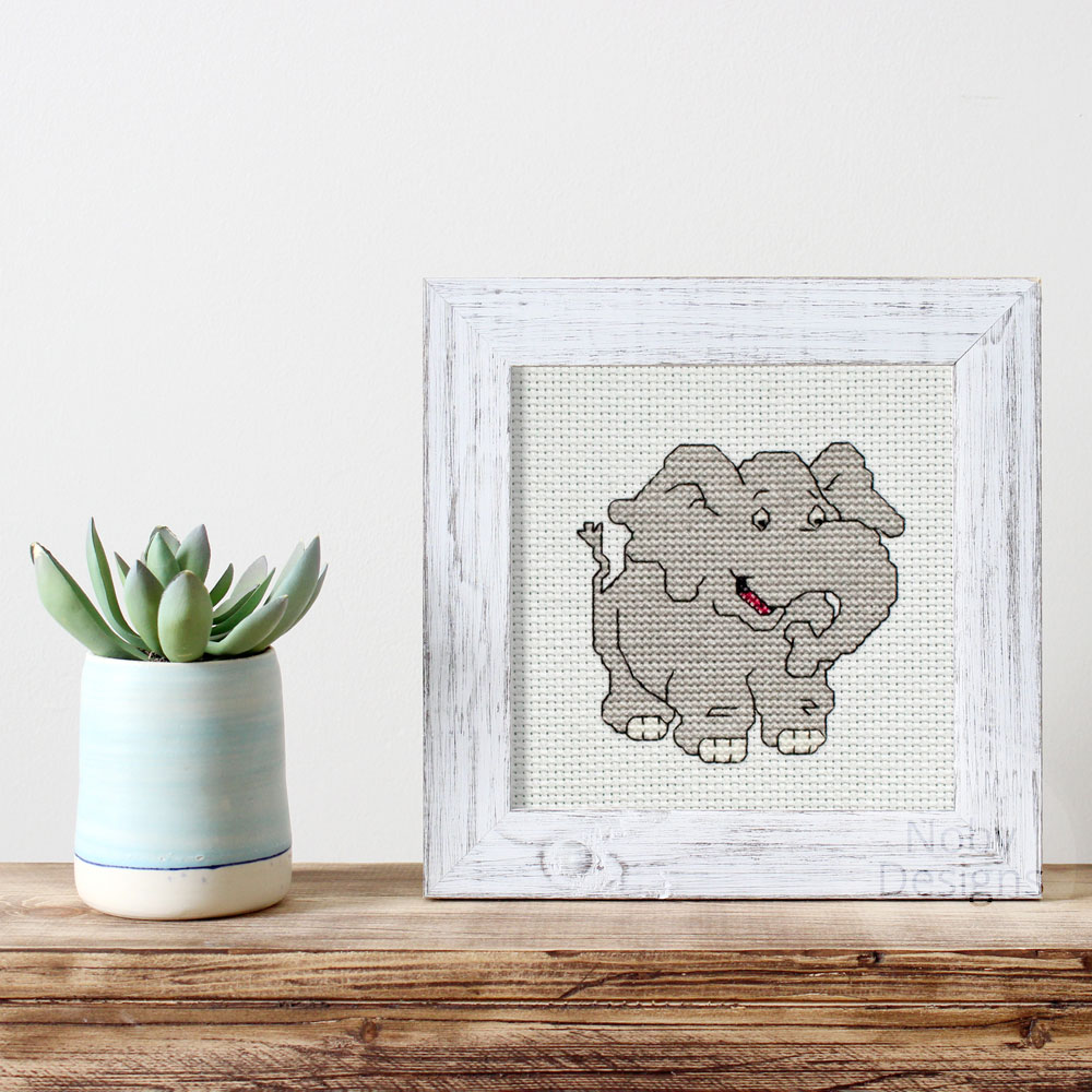 Cross stitch elephant in frame